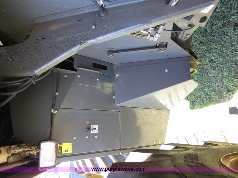 image for item F8776 2009 Caterpillar Lexion 560R 2WD combine