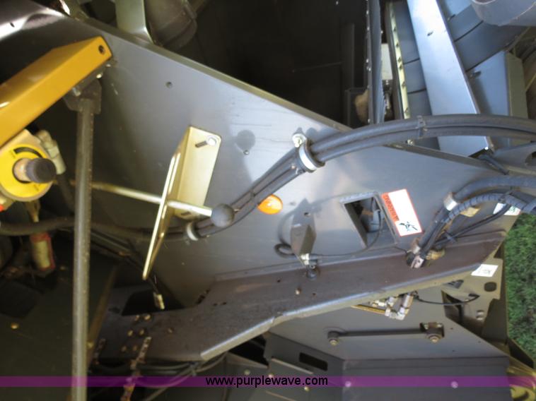 image for item F8776 2009 Caterpillar Lexion 560R 2WD combine