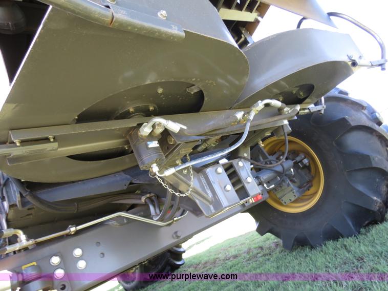 image for item F8776 2009 Caterpillar Lexion 560R 2WD combine