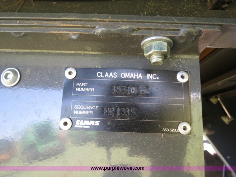 image for item F8776 2009 Caterpillar Lexion 560R 2WD combine