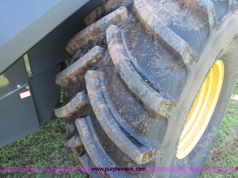 image for item F8776 2009 Caterpillar Lexion 560R 2WD combine