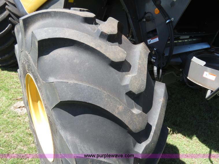 image for item F8776 2009 Caterpillar Lexion 560R 2WD combine