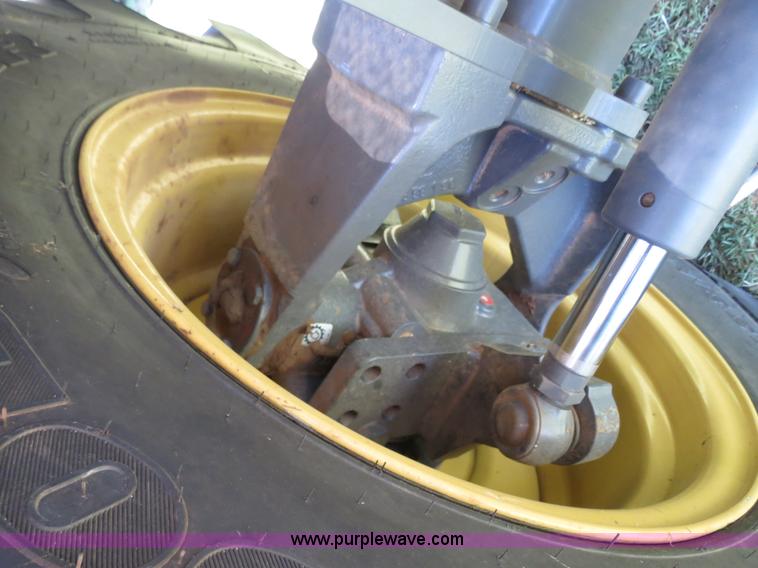 image for item F8776 2009 Caterpillar Lexion 560R 2WD combine