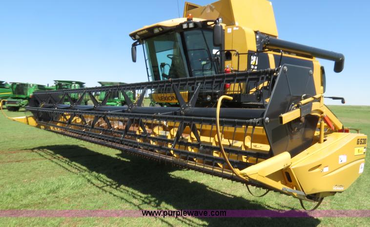 image for item F8776 2009 Caterpillar Lexion 560R 2WD combine