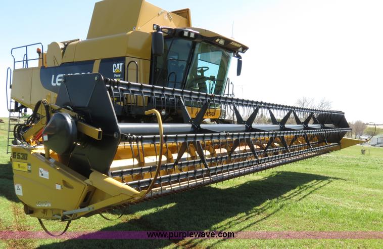 image for item F8776 2009 Caterpillar Lexion 560R 2WD combine
