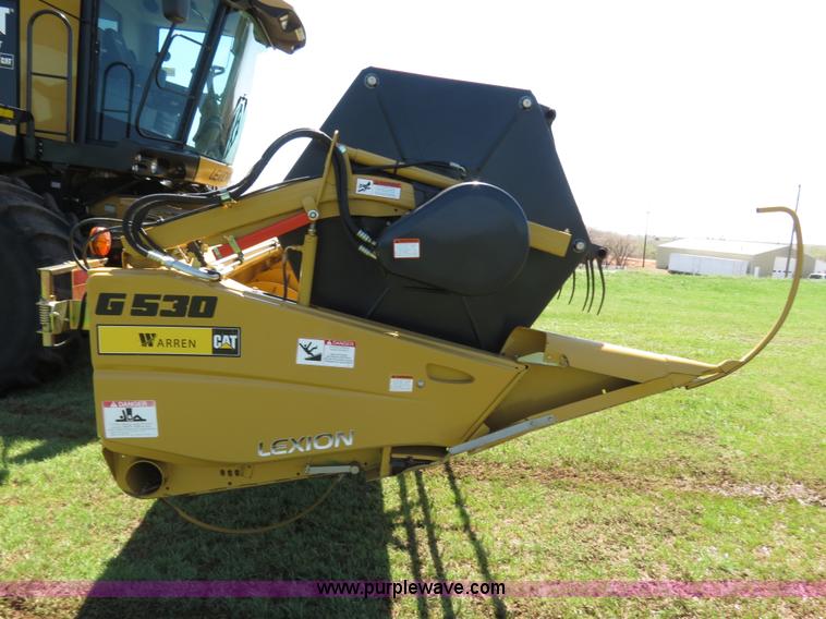 image for item F8776 2009 Caterpillar Lexion 560R 2WD combine