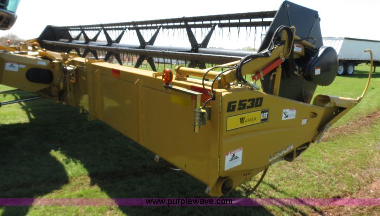 image for item F8776 2009 Caterpillar Lexion 560R 2WD combine