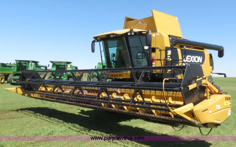 image for item F8776 2009 Caterpillar Lexion 560R 2WD combine