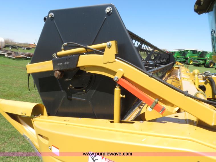 image for item F8776 2009 Caterpillar Lexion 560R 2WD combine