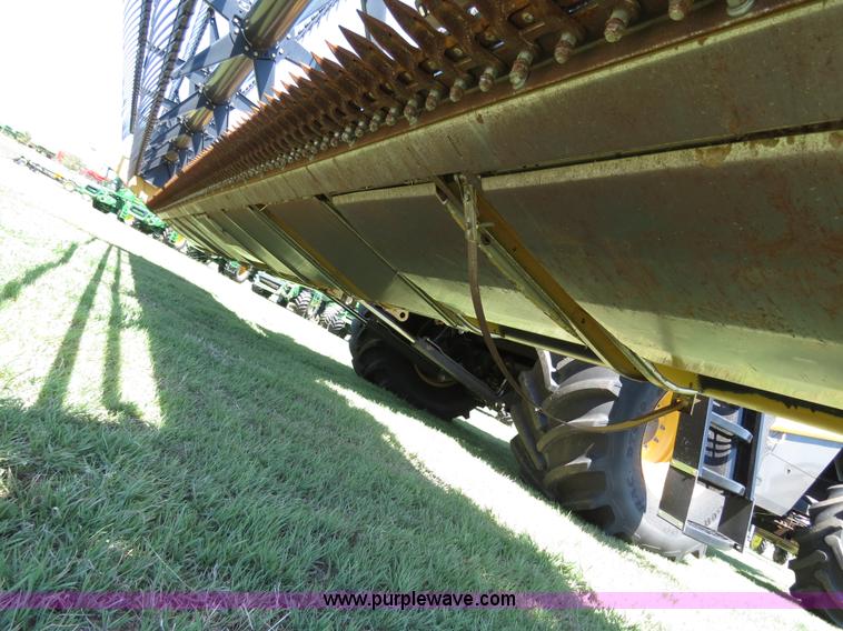 image for item F8776 2009 Caterpillar Lexion 560R 2WD combine