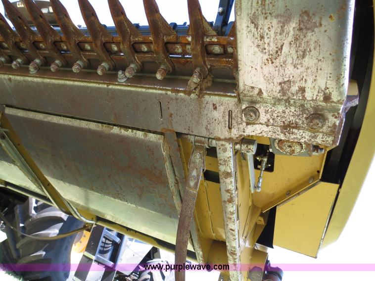 image for item F8776 2009 Caterpillar Lexion 560R 2WD combine