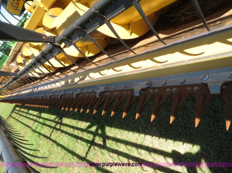 image for item F8776 2009 Caterpillar Lexion 560R 2WD combine