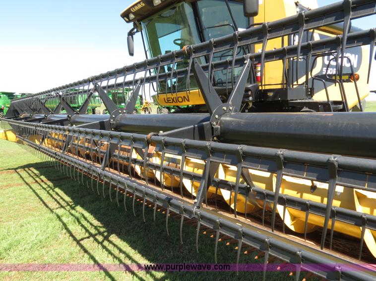 image for item F8776 2009 Caterpillar Lexion 560R 2WD combine