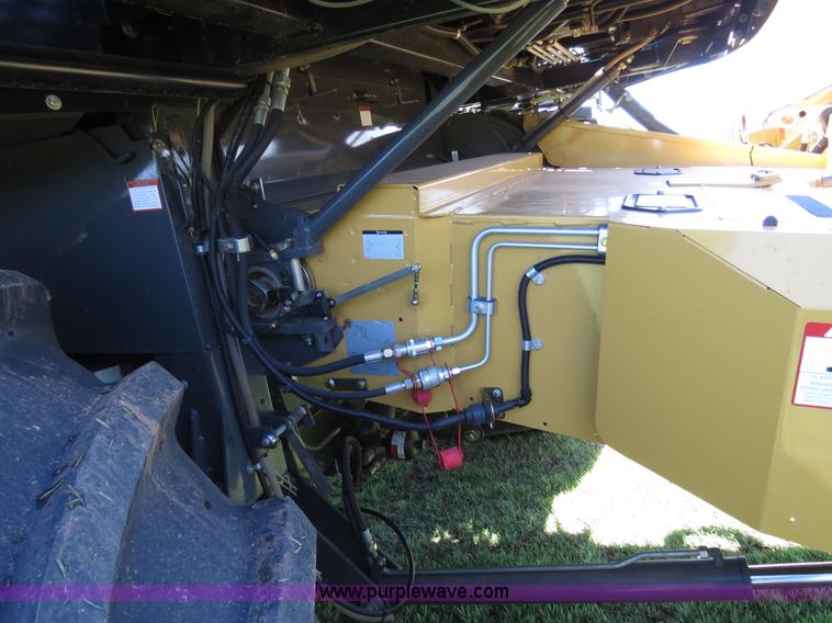 image for item F8776 2009 Caterpillar Lexion 560R 2WD combine