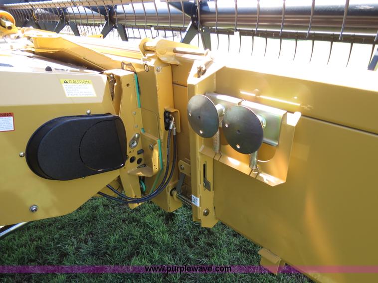 image for item F8776 2009 Caterpillar Lexion 560R 2WD combine