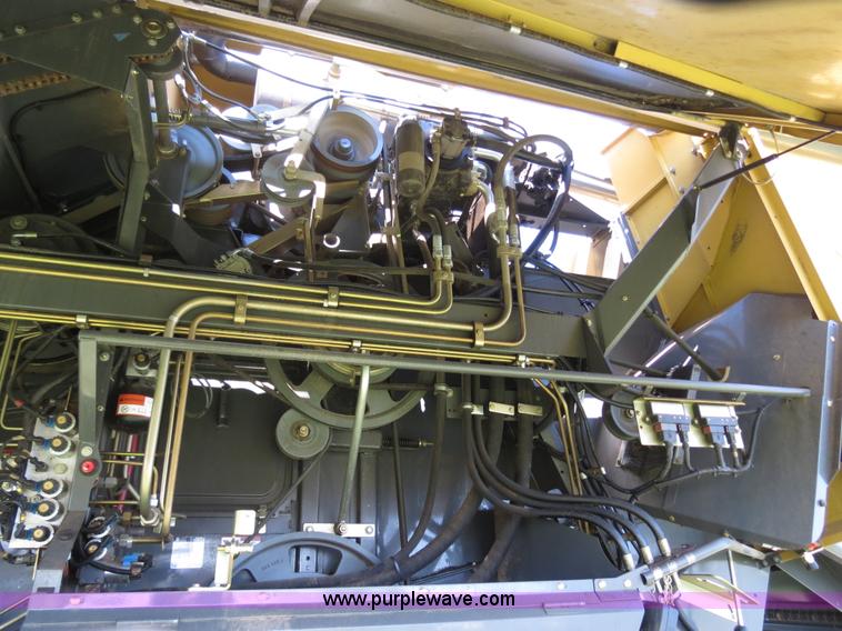 image for item F8776 2009 Caterpillar Lexion 560R 2WD combine