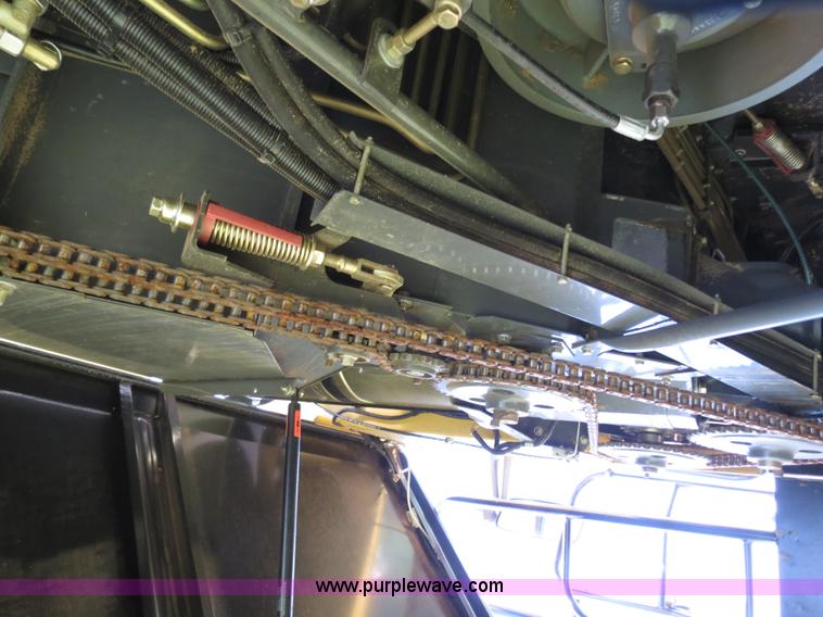 image for item F8776 2009 Caterpillar Lexion 560R 2WD combine