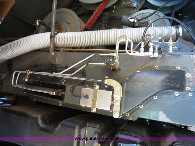 image for item F8776 2009 Caterpillar Lexion 560R 2WD combine