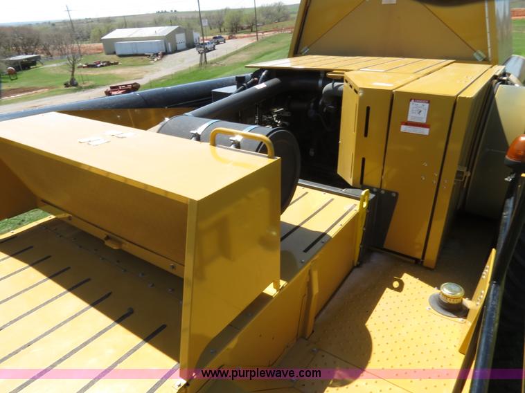 image for item F8776 2009 Caterpillar Lexion 560R 2WD combine