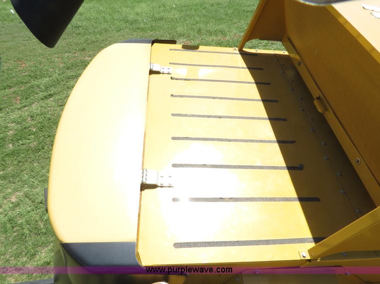 image for item F8776 2009 Caterpillar Lexion 560R 2WD combine