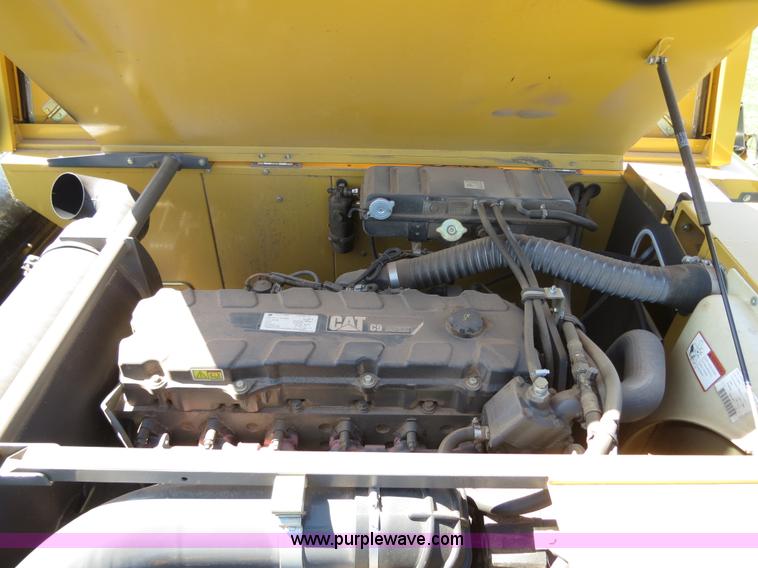 image for item F8776 2009 Caterpillar Lexion 560R 2WD combine