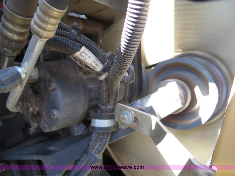 image for item F8776 2009 Caterpillar Lexion 560R 2WD combine