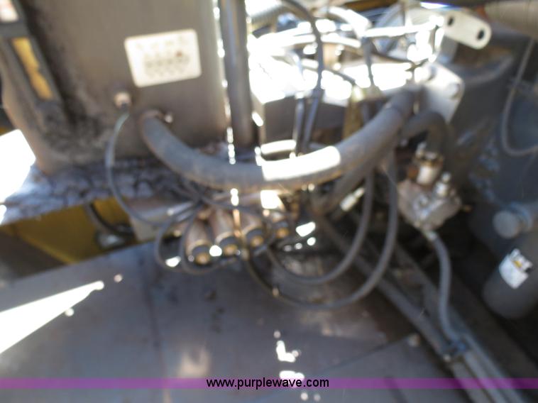 image for item F8776 2009 Caterpillar Lexion 560R 2WD combine