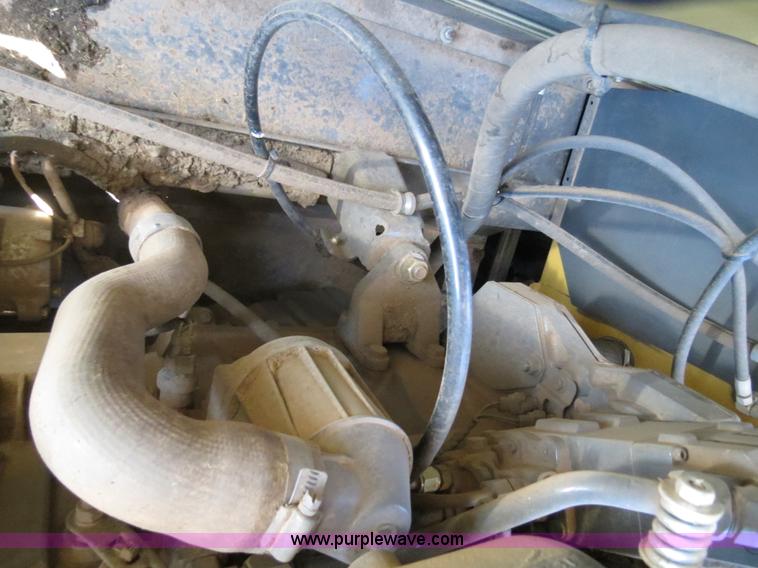 image for item F8776 2009 Caterpillar Lexion 560R 2WD combine