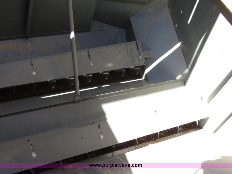 image for item F8776 2009 Caterpillar Lexion 560R 2WD combine