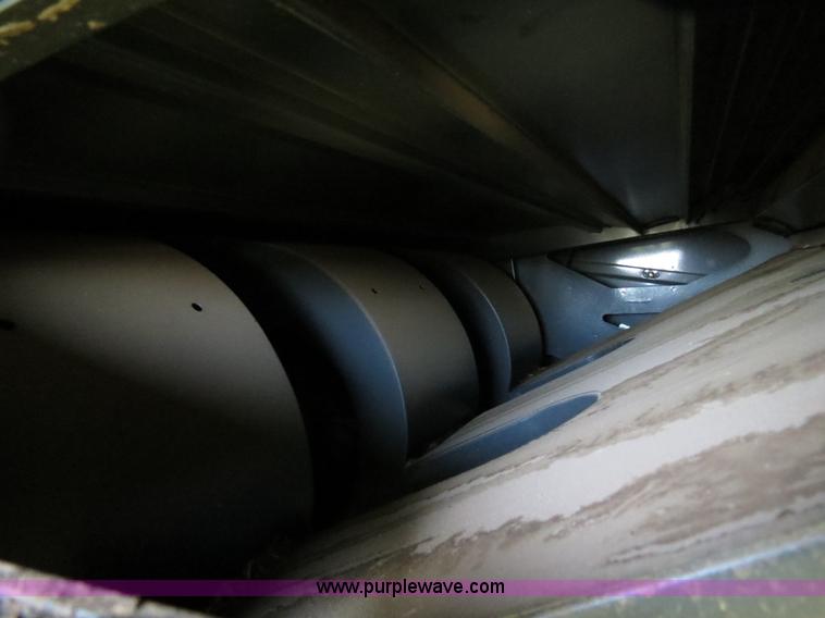 image for item F8776 2009 Caterpillar Lexion 560R 2WD combine