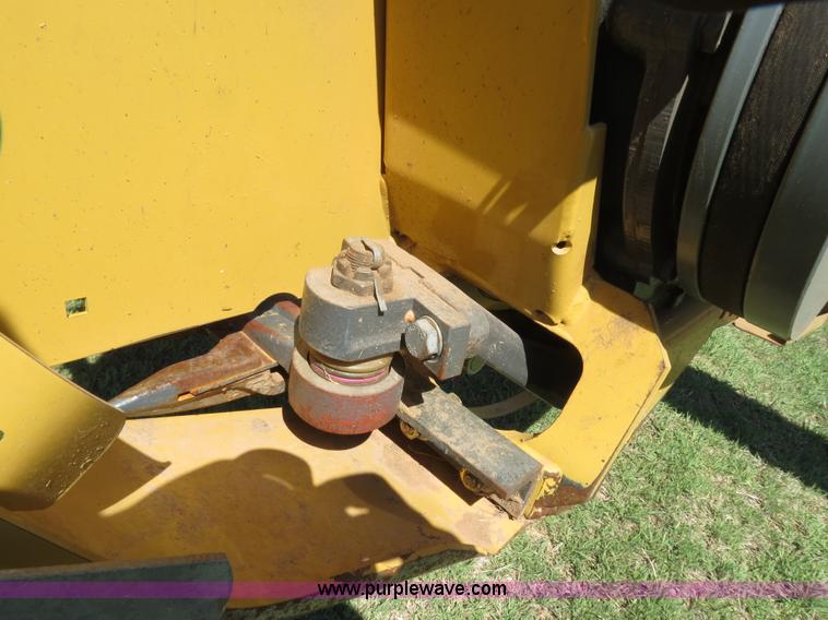 image for item F8776 2009 Caterpillar Lexion 560R 2WD combine