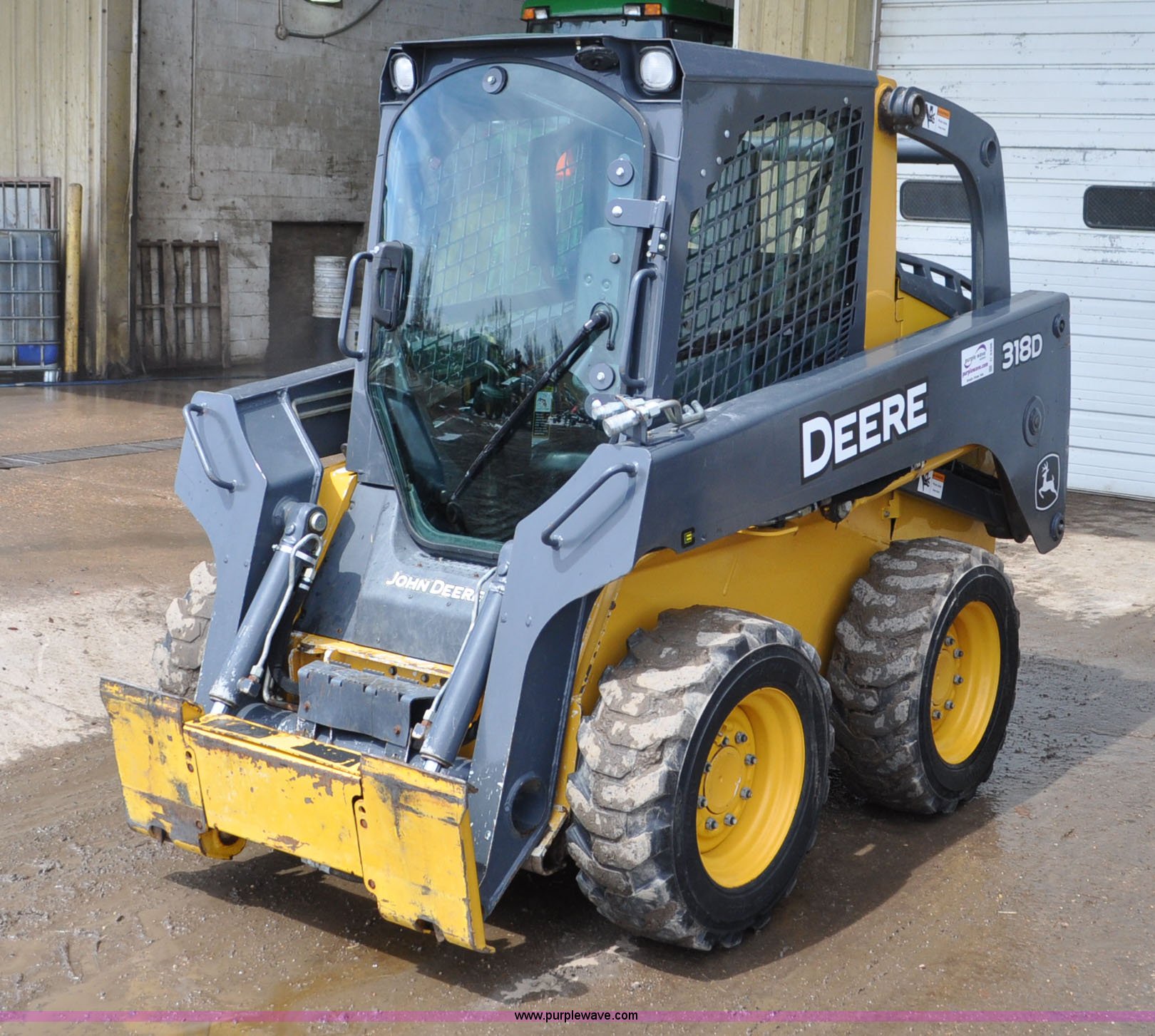 2011 John Deere 318D skid steer in Greeley, CO Item C3496 sold