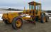Graders and scrapers