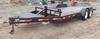 2002 Neal tandem axle tilt deck trailer 14 L x 80 W deck 7 L tongue Stake pockets Cylinder assist ti...