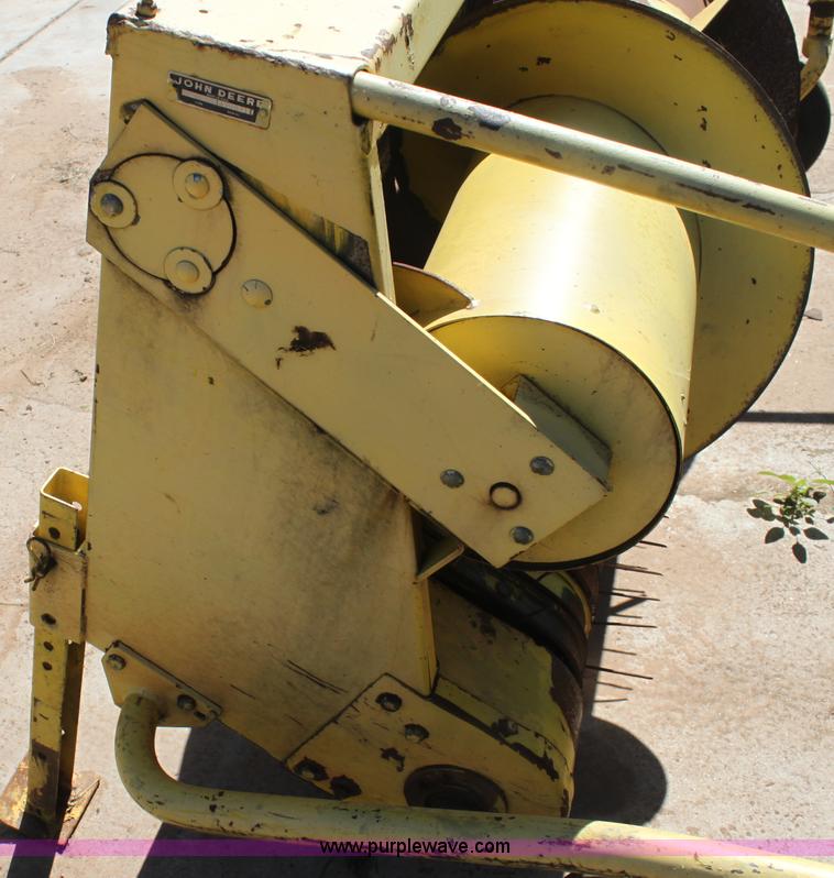 image for item AE9215 John Deere 7' grass pickup attachment