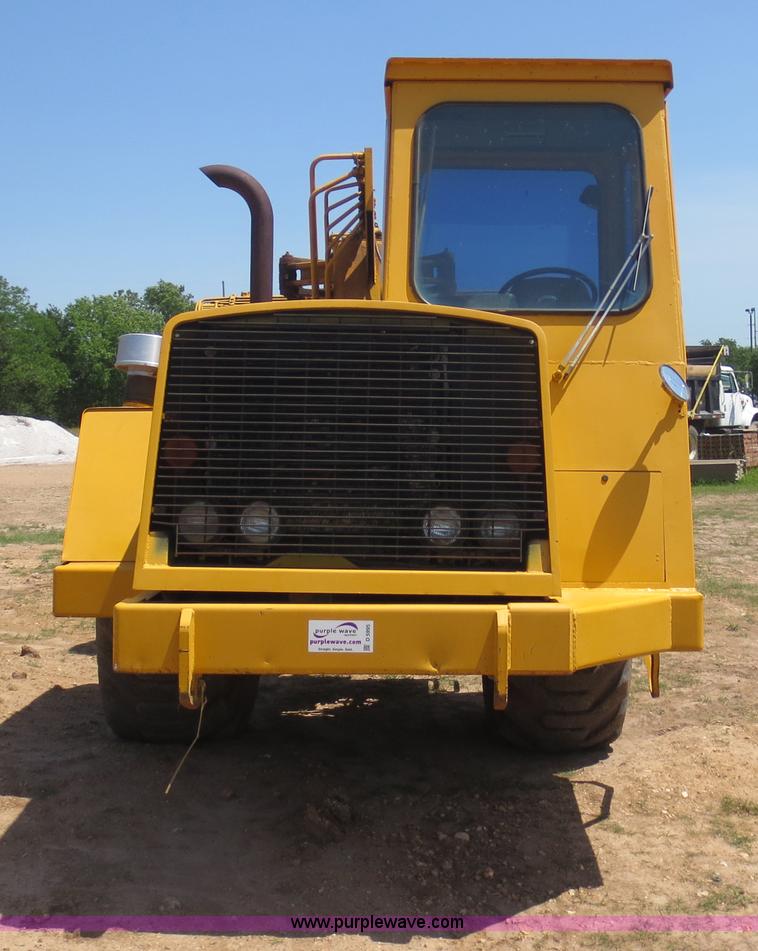 image for item D5995 1980 John Deere 762 paddle wheel scraper