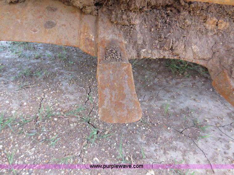 image for item D5995 1980 John Deere 762 paddle wheel scraper