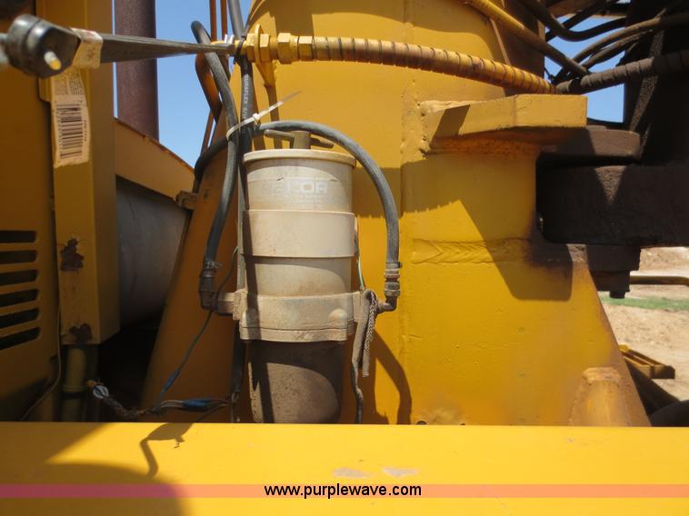 image for item D5995 1980 John Deere 762 paddle wheel scraper