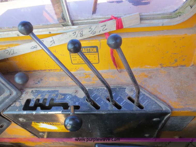 image for item D5995 1980 John Deere 762 paddle wheel scraper