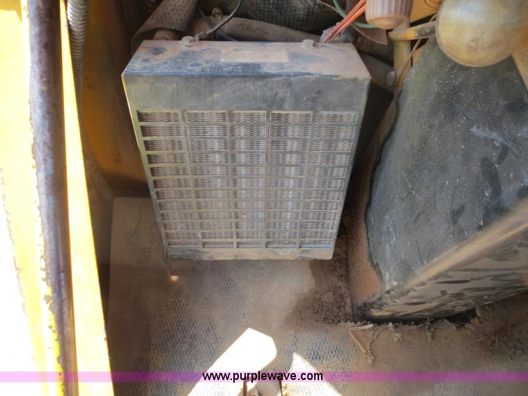 image for item D5995 1980 John Deere 762 paddle wheel scraper