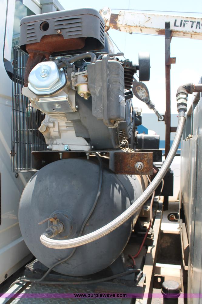 image for item G5737 2003 International DuraStar 4300 service truck