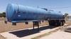 1981 Adams tank trailer 38 6 L x 8 W x 10 5 H 150 barrel capacity Dual side hose tray Front and rear...