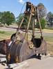 PMCO clam sheel bucket Three teeth per side One missing 3/4 cu yd capacity Cable operated 32 W Opens...