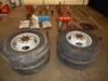 Assorted automotive equipment 4 Uniroyal 215/85R16 tires Wheels Jacks Stands Boomers Straps Snow cha...