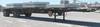2001 Fruehauf flatbed spread axle float trailer 10 axle spread 102 W Steel frame Wood deck Stake sid...
