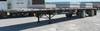 2000 Utility flatbed tandem axle float trailer 102 W 10 axle spread Steel frame Aluminum and wood de...