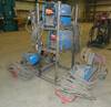 2 Miller welders 2 Miller S T45 wire feed heads Carts and stand included Serial LJ231351A, LJ260056...
