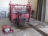 Bowman hydraulic cattle chute Hydraulic head gate, tail gate, and top and bottom squeeze Hydraulic t...