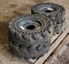 McClaren solid skid steer tires Removed from a Bobcat S185 skid steer 1783 E 1500 Road Lawrence, KS ...