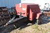 Smith air compressor 1,517 hours on meter Ford engine 100 CFM 4 air hoses 25 L Pintle hitch View eq...